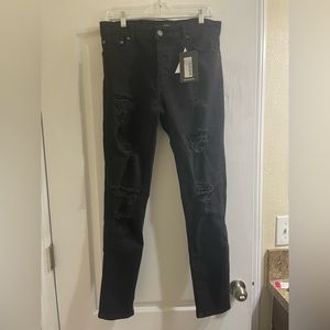 Skinny Stretch All Over Rip Pants